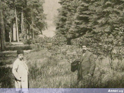 Mozaffar el Din Ghajar with his Special Assistant Walking By a River in France - Mozaffar el Din Ghajar with his Special Assistant Walking By a River in France